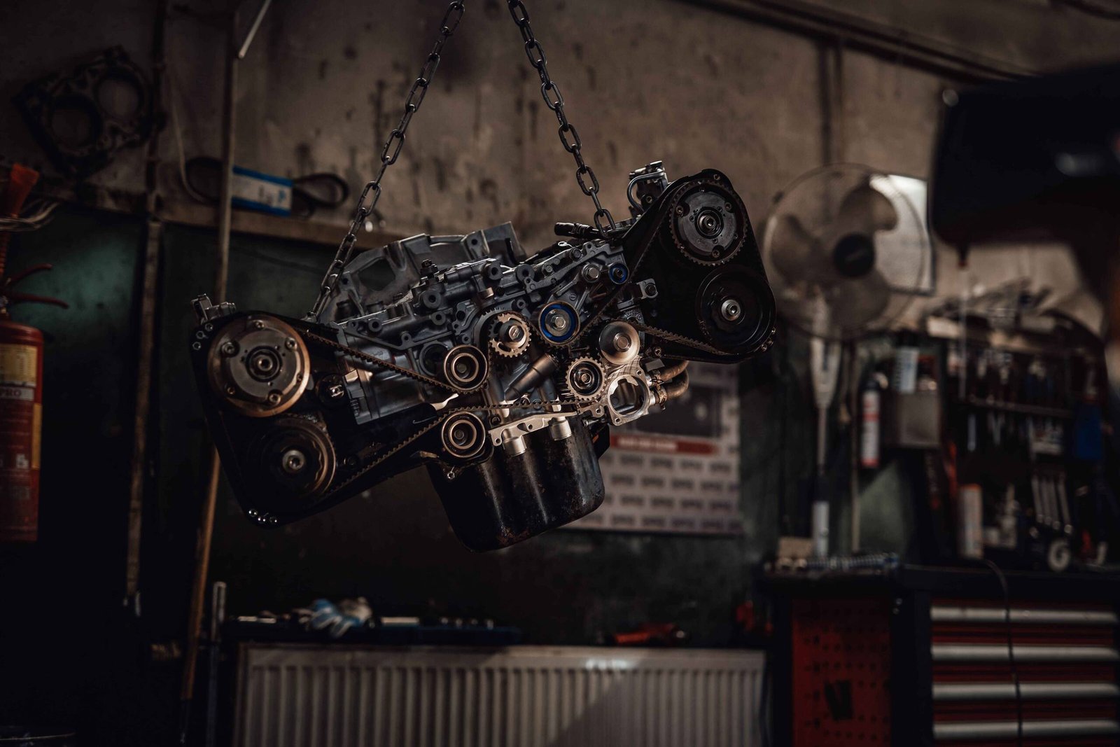 Suspended Boxer Engine In A Dark Garage Or Worksho 2023 11 27 05 26 16 Utc 1 Scaled